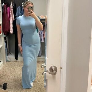 Blue figure hugging dress